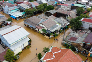 Aerial POV view Depiction of flooding. devastation wrought after massive natural disasters at Bekasi - Indonesia